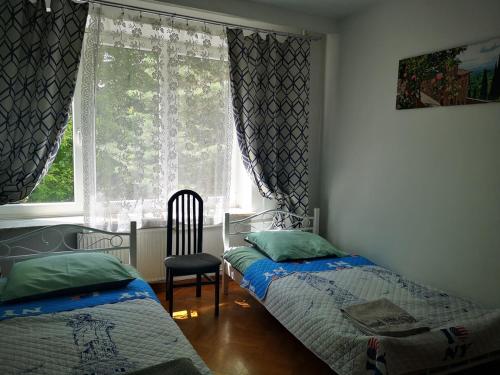 Ένα ή περισσότερα κρεβάτια σε δωμάτιο στο Mira Rent House