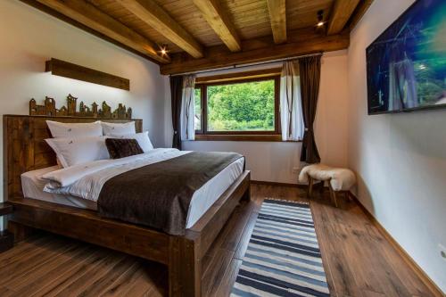 Llit o llits en una habitació de Avalanche Plaiul Foii