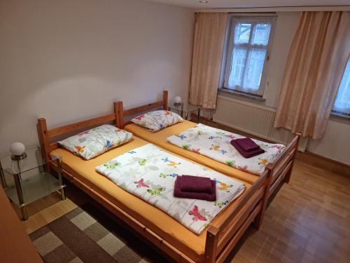 Ένα ή περισσότερα κρεβάτια σε δωμάτιο στο Ferienhaus Wernigerode "Am Schlossbühel" 5 Schlafzimmer