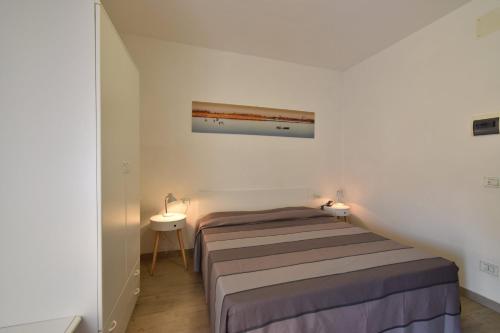 Postel nebo postele na pokoji v ubytování Hotel Zanin