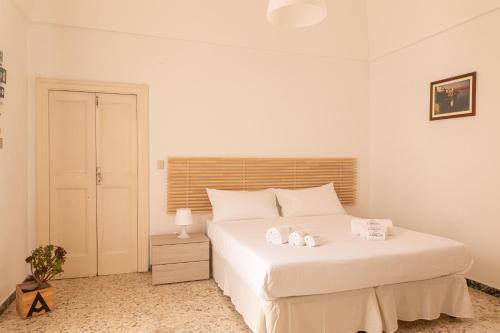 En eller flere senge i et værelse på Casa Labbate