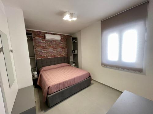 Katil atau katil-katil dalam bilik di Matthew's Home B&B