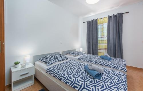 Posteľ alebo postele v izbe v ubytovaní Holiday House Vita