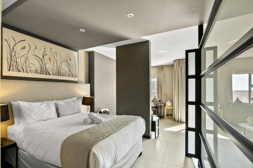 Cama o camas de una habitación en Easy Stay - The Vantage Rosebank