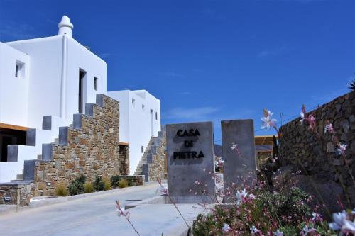 a building with a sign that reads cafe of africa at CASA DI PIETRA MYKONOS in Klouvas