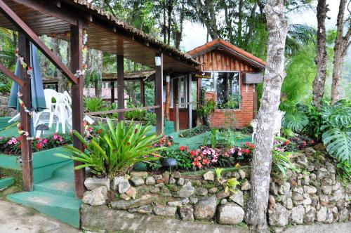 Ein Garten an der Unterkunft Pousada e Spa Vrindávana