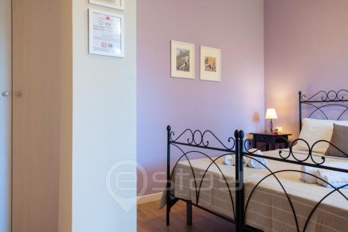 Un ou plusieurs lits dans un hébergement de l'établissement House Marcella
