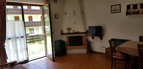 Gallery image of Appartamento con giardino in Predazzo