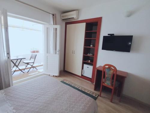 TV a/nebo společenská místnost v ubytování Apartments and Rooms Nikša