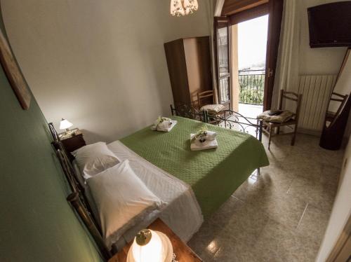 Postel nebo postele na pokoji v ubytování B&B Rosy Gallo