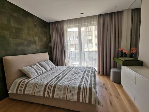 Krevet ili kreveti u jedinici u okviru objekta MyCasa CBD