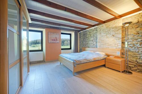 Кровать или кровати в номере Le Clos Arboré (Gîte)