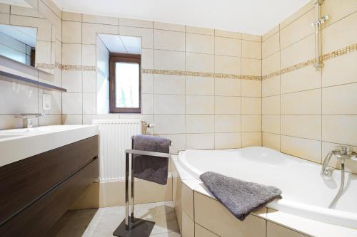 Ванная комната в Le Clos Arboré (Gîte)