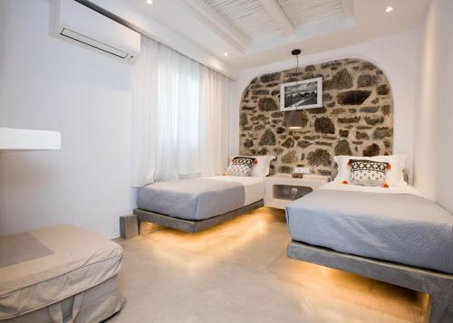 Katil atau katil-katil dalam bilik di Mykonos Village