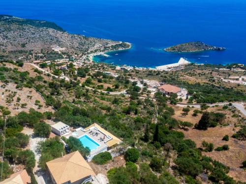 an aerial view of the villa and the sea at Armyra Villas in Volimes