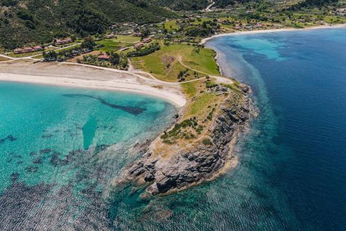an aerial view of an island in the ocean at Bay View Suites in Ayios Nikolaos Sithonia