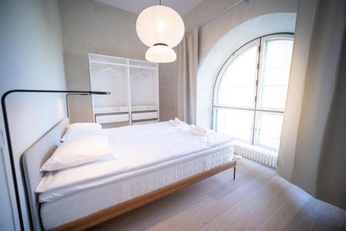 Postel nebo postele na pokoji v ubytování Baltic Accommodation - Urban Style Apartment