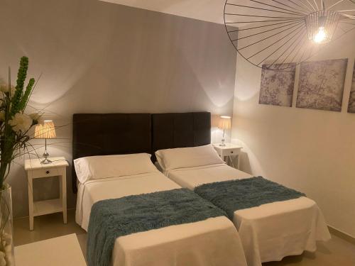 Cama o camas de una habitación en Villalia Jonay, "Flexitime"