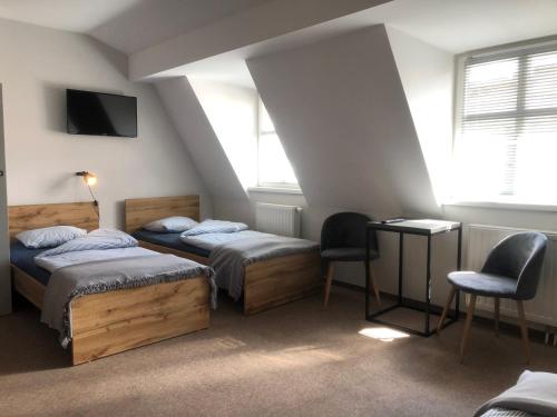 Katil atau katil-katil dalam bilik di Bemma City Rooms