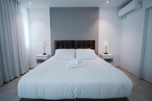 Postel nebo postele na pokoji v ubytování Unique Hotel Ashdod