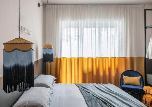 Una cama o camas en una habitación de MARCANTONIO HOME ROME - Vatican -