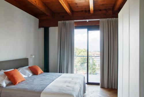 Ένα ή περισσότερα κρεβάτια σε δωμάτιο στο Residenza Puoti