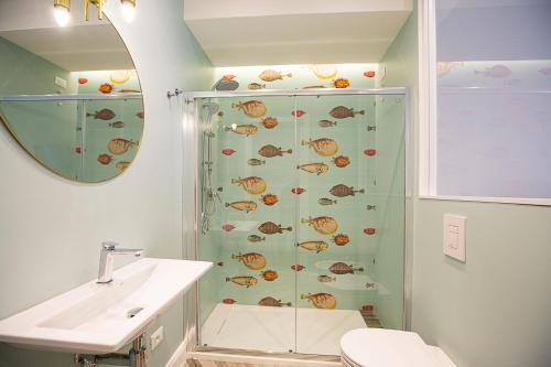 a bathroom with a shower and a sink at La Terrazza Antica Dimora in Campobasso