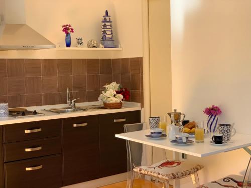 a kitchen with a sink and a counter top at L'Angolo di Felicia in Nerano