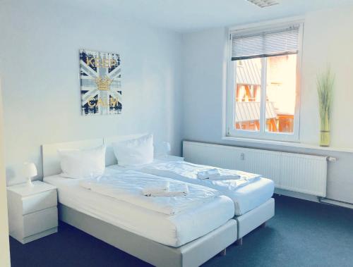 Postel nebo postele na pokoji v ubytování BNB Potsdamer Platz Rooms & Apartments