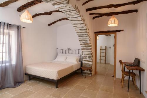 Ένα ή περισσότερα κρεβάτια σε δωμάτιο στο Irida house