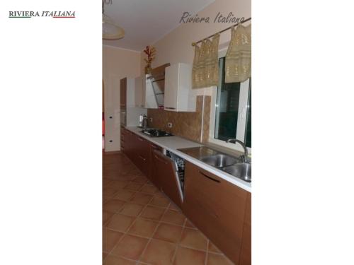 A kitchen or kitchenette at Villa Parco Meridiana