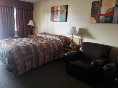 Ein Bett oder Betten in einem Zimmer der Unterkunft Dockside Inn