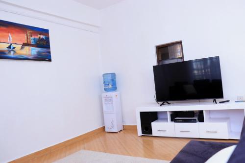 TV a/nebo společenská místnost v ubytování Chelsea's Haven