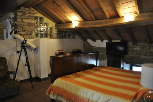 A bed or beds in a room at B&B la Forgia