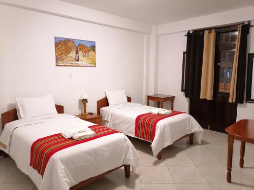 Postel nebo postele na pokoji v ubytování Chachapoyas Backpackers Hostal Boutique