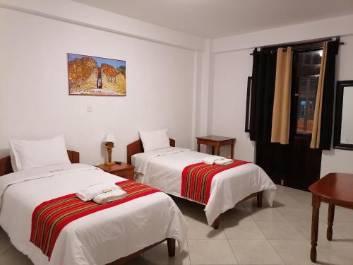 Postel nebo postele na pokoji v ubytování Chachapoyas Backpackers Hostal Boutique