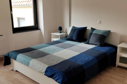 Le Blue, appartement de standing en hyper-centre tesisinde bir odada yatak veya yataklar