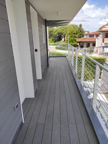 a walkway leading to a porch on a house at B&B Le Nazioni in Lido delle Nazioni