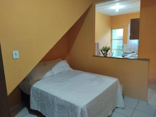 Кровать или кровати в номере Loftzinho Angra dos Reis