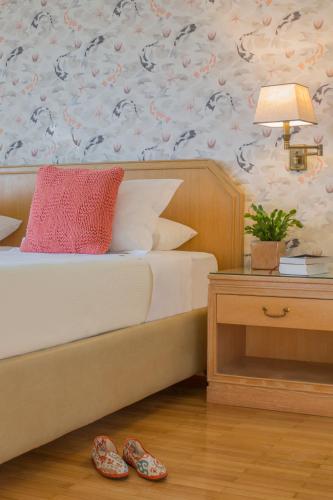 Cama o camas de una habitación en Delice Hotel - Family Apartments