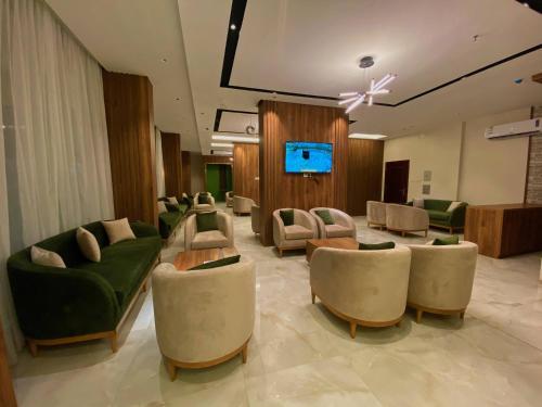 TV a/nebo společenská místnost v ubytování Quartz Executive Hotel