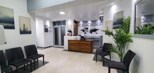 Lobbyn eller receptionsområdet på Boca Grande Hotel Suites