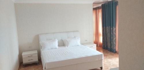 Tempat tidur dalam kamar di Park Hotel al Bustan
