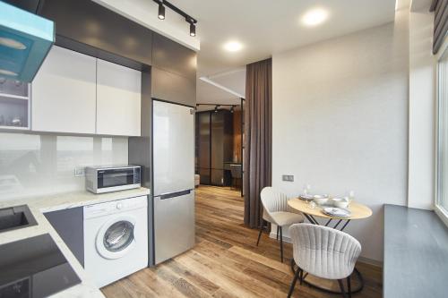 Una cocina o zona de cocina en Board apart hotel