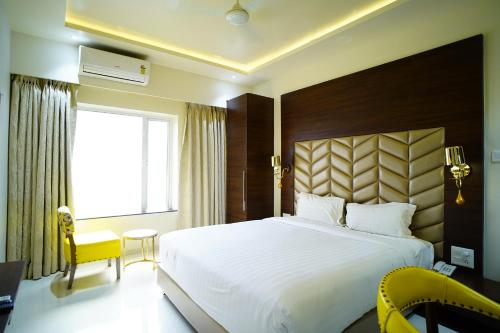 Postel nebo postele na pokoji v ubytování Orange Tree Hotels