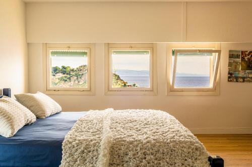 Postel nebo postele na pokoji v ubytování Sea Life - Taormina