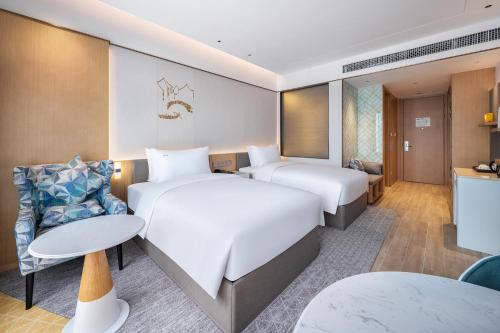 Postel nebo postele na pokoji v ubytování Holiday Inn Tongren Wanshan by IHG