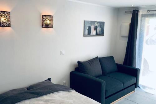 Zona de estar de Studio « L’anthracite ».