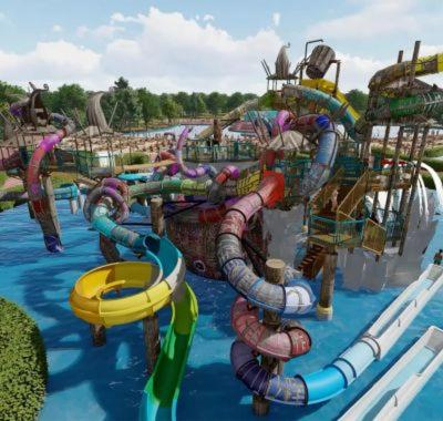 einen Wasserpark mit einer Wasserrutsche in der Unterkunft Sollaris Appartement 1ère étage à 11km de Europa-Park in Friesenheim