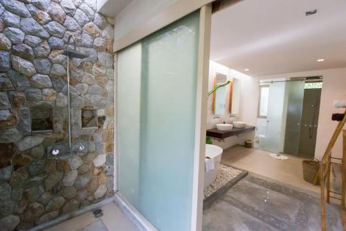 Postel nebo postele na pokoji v ubytování Metadee Concept Hotel